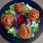 Top view of Farro Kidney Beans Balls with a side salad