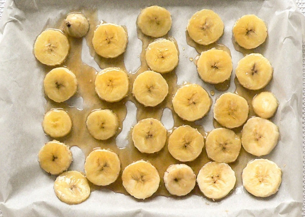 Banana slices drizzled with syrup