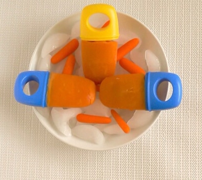 Top view of carrot smoothie popsicles