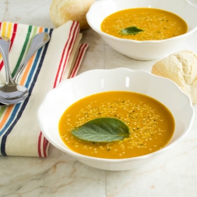 A 45 degree angle view of Spicy Carrot Amaranth Soup