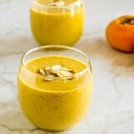 Servings glasses filled with Persimmons Pumpkin Orange Smoothie