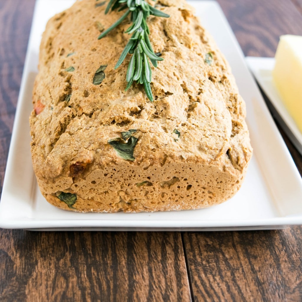 A front view of tomato herbed spelt bread