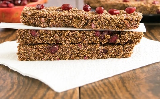 Front view of stacked puffed amaranth pomegranate bars