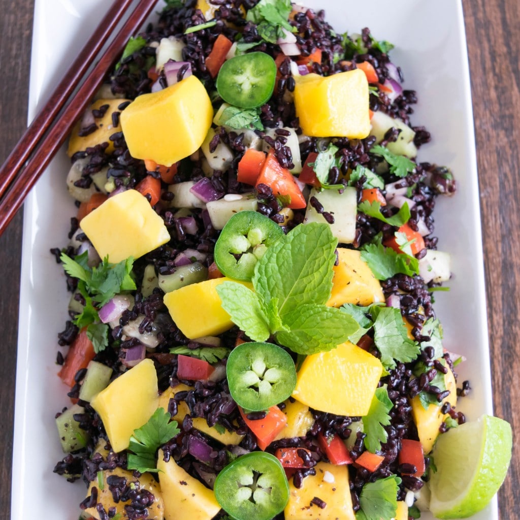 Top close up view of black rice mango salad