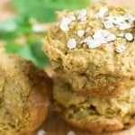 A stack of Savory Kale Oatmeal Cups on a wooden board