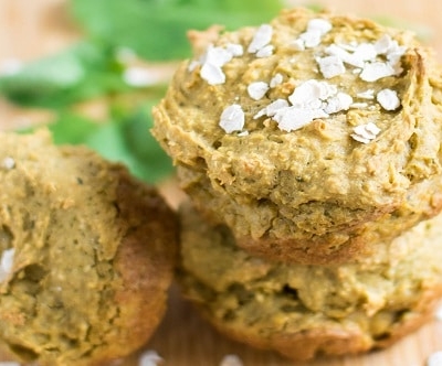 A stack of Savory Kale Oatmeal Cups on a wooden board