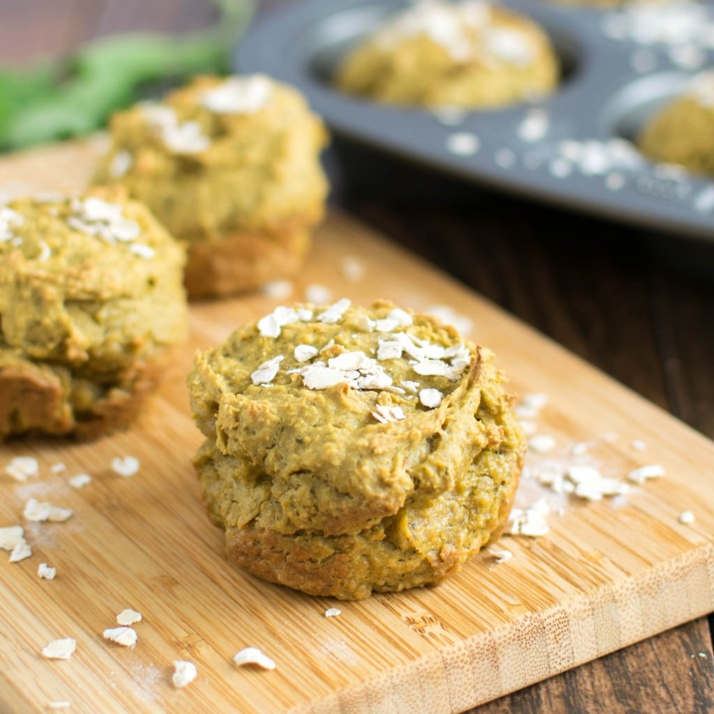 A close up view of Savory Kale Oatmeal Cups on a wooden board