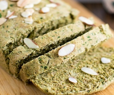 A close up view of sliced quick spinach sauce bread
