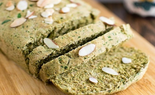 A close up view of sliced quick spinach sauce bread
