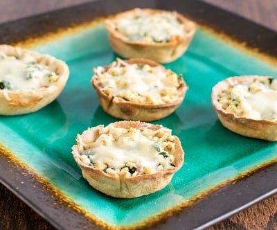 a front view of served tofu spinach stiffed crispy cups.