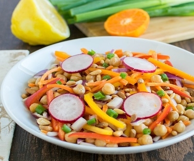 A front view of chickpeas and mini sweet peppers salad
