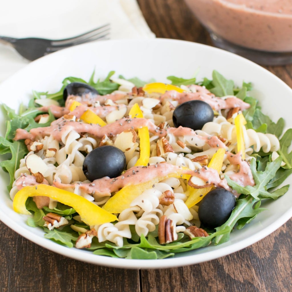 A close up view of Arugula Pasta Rhubarb Chia Salad