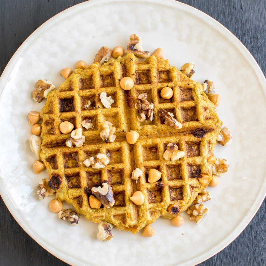 Top view of butterscotch carrot millet waffle on a plate