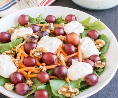 Kale Arugula Salad with Yogurt Dip| Yummy refreshing salad with the combination of greens, fruits nuts and yogurt. Healthy and lip smacking| kiipfit.com