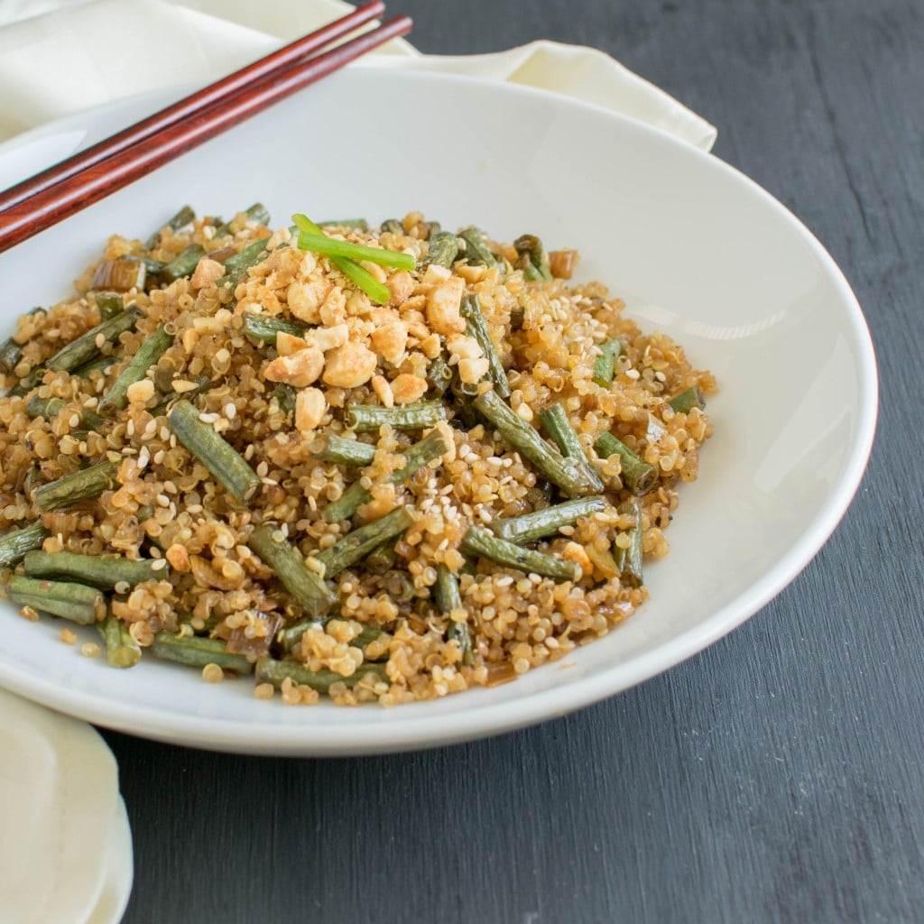 a 45 degree angle view of asian style long beans and quinoa