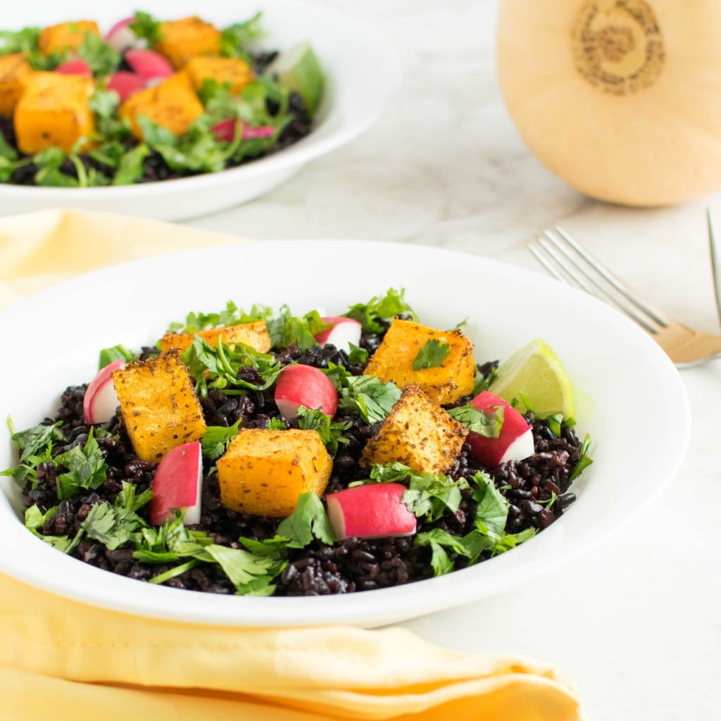 A front view of cajun butternut squash & black rice salad