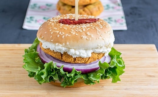 A front view of loaded Lentil Curry Burger