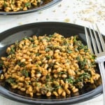 a front view of plated masala spinach farro