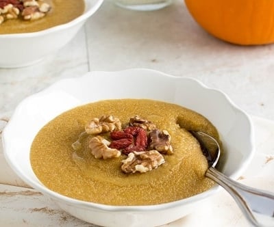 Pumpkin Amaranth Porridge in the serving bowl with a spoon