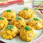 A serving plate filled with carrot sweet potato almond cookies topped with sprinkles