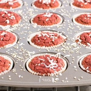 a front view of beetroot quinoa muffins in the tray.