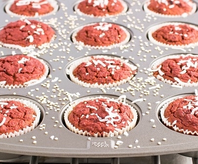 a front view of beetroot quinoa muffins in the tray.