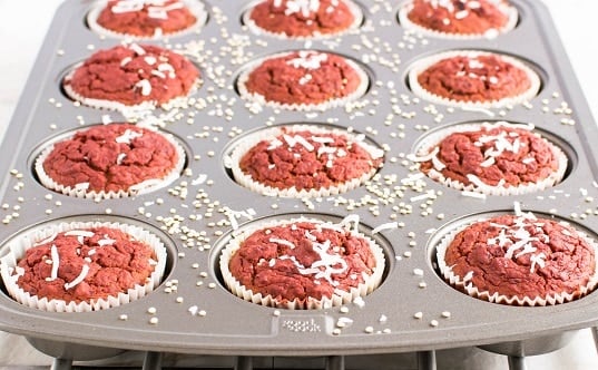 a front view of beetroot quinoa muffins in the tray.