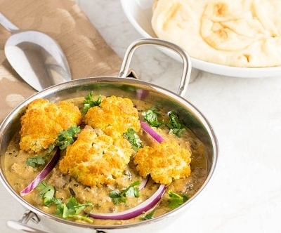a 45 degree angle view of roasted cauliflower curry
