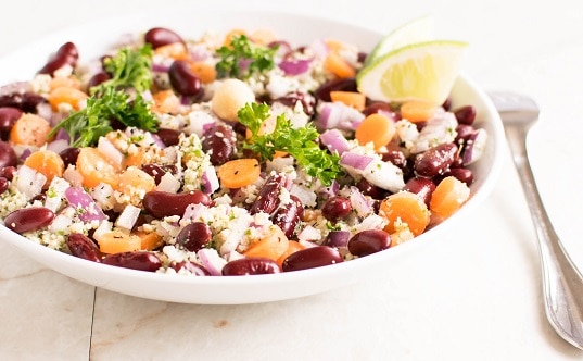 A front view of kidney beans salad with parsley macadamia dressing