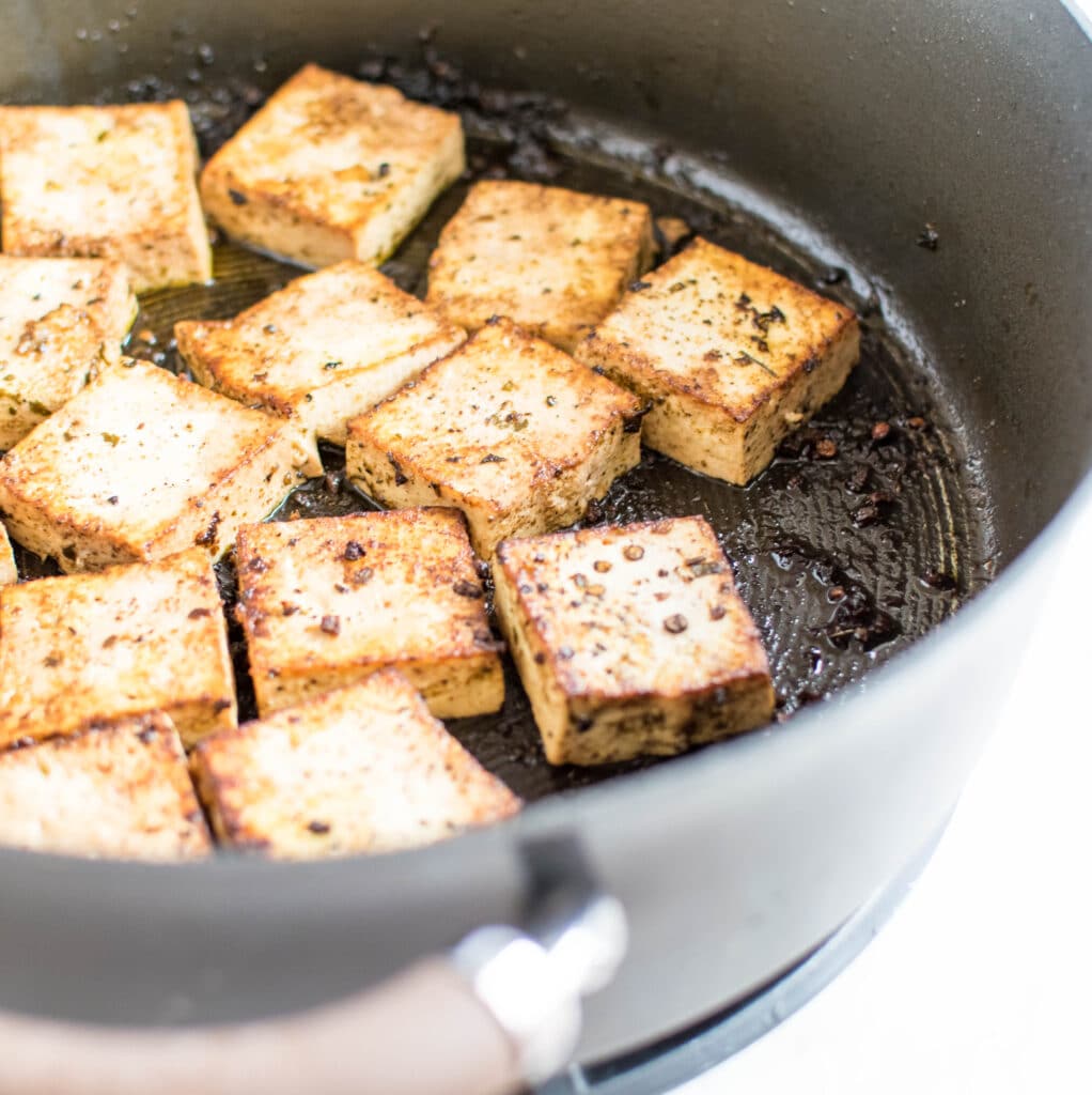 Tofu being cooked in herbs and red wine vinegar is shown in this image | kiipfit.com