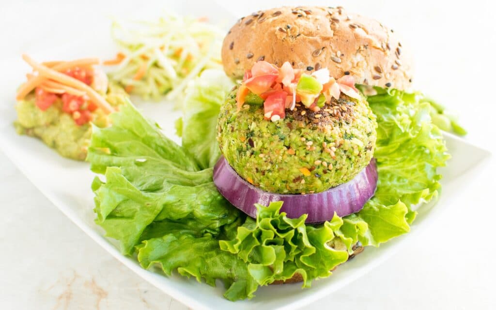 A 45 degree angle view of Cilantro Edamame Burger