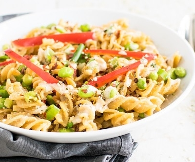 A front view of chickpea fusilli in hemp tahini sauce