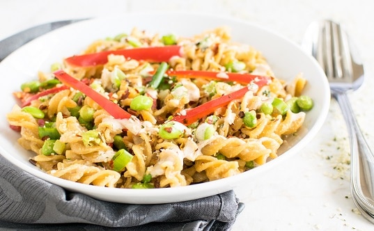 A front view of chickpea fusilli in hemp tahini sauce