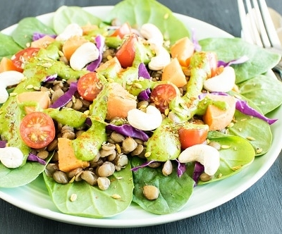 A front view of Lentil Sweet Potato Salad with Green Sauce