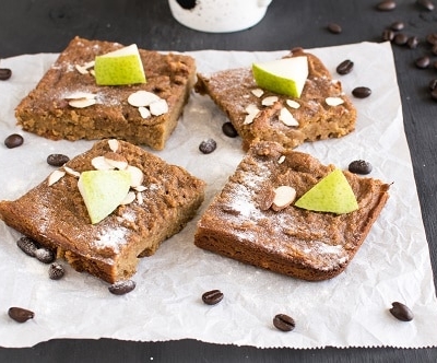 A front view of sliced caramelized pear coffee brownies