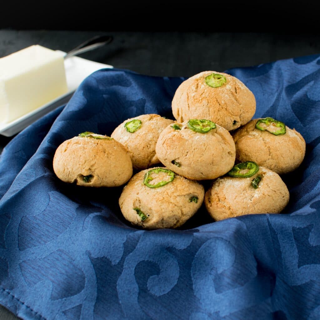 A basket full of Garlic Jalapeno Oatmeal Rolls