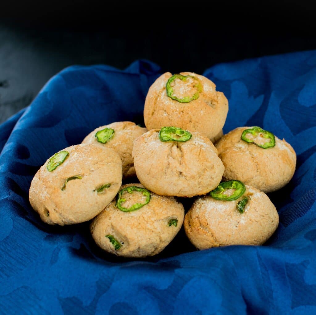 A front view of the stack of Garlic Jalapeno Oatmeal Rolls 