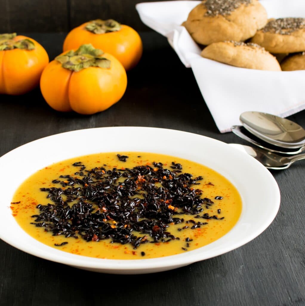 a 45 degree angle view of forbidden black rice persimmons soup