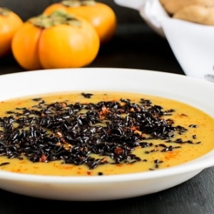 a front view of forbidden black rice persimmons soup