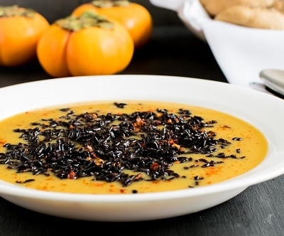 a front view of forbidden black rice persimmons soup