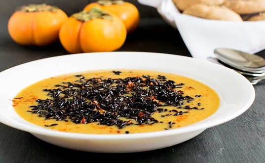 a front view of forbidden black rice persimmons soup