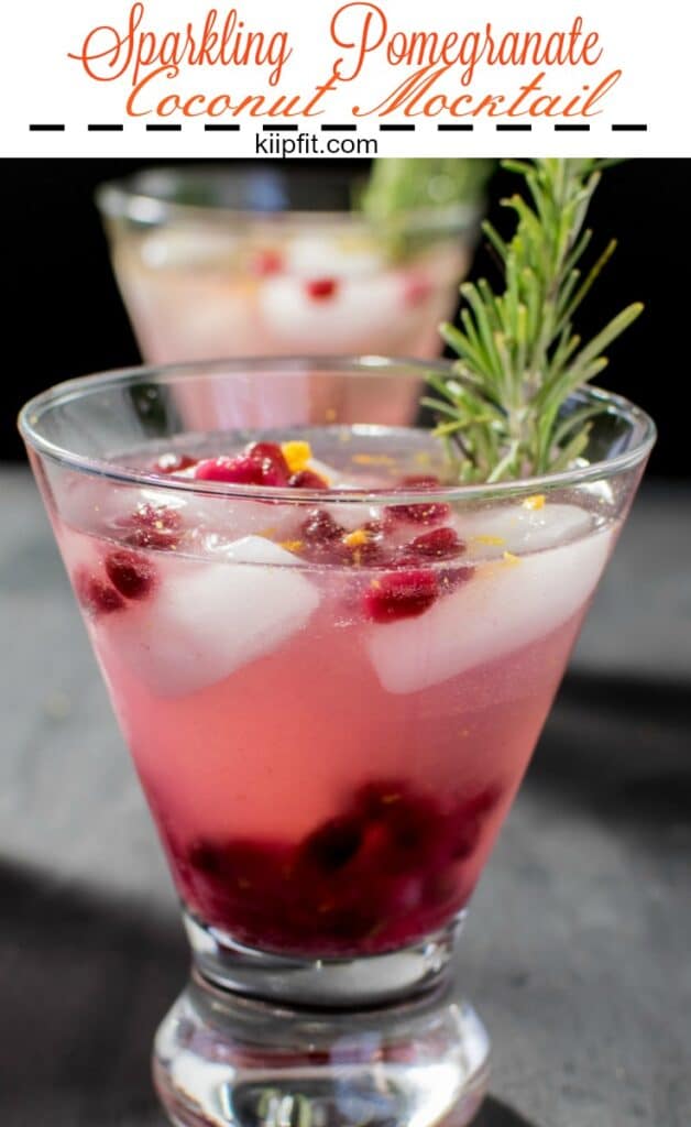 A front view of a serving glass with Sparkling Pomegranate Coconut Mocktail