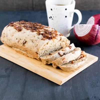 A side view of sliced Roasted Onion Oatmeal Bread
