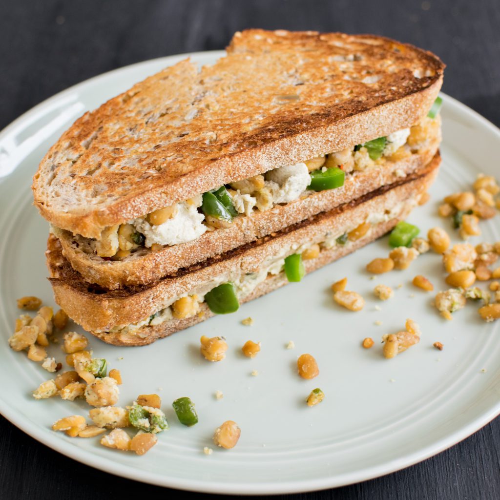 A side angle view of Jalapeno Tempeh Cheese Sandwich 