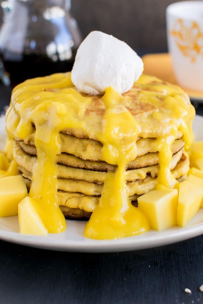 Close up front view of Mango Cream Cheese Vegan Pancakes with Mango Puree 