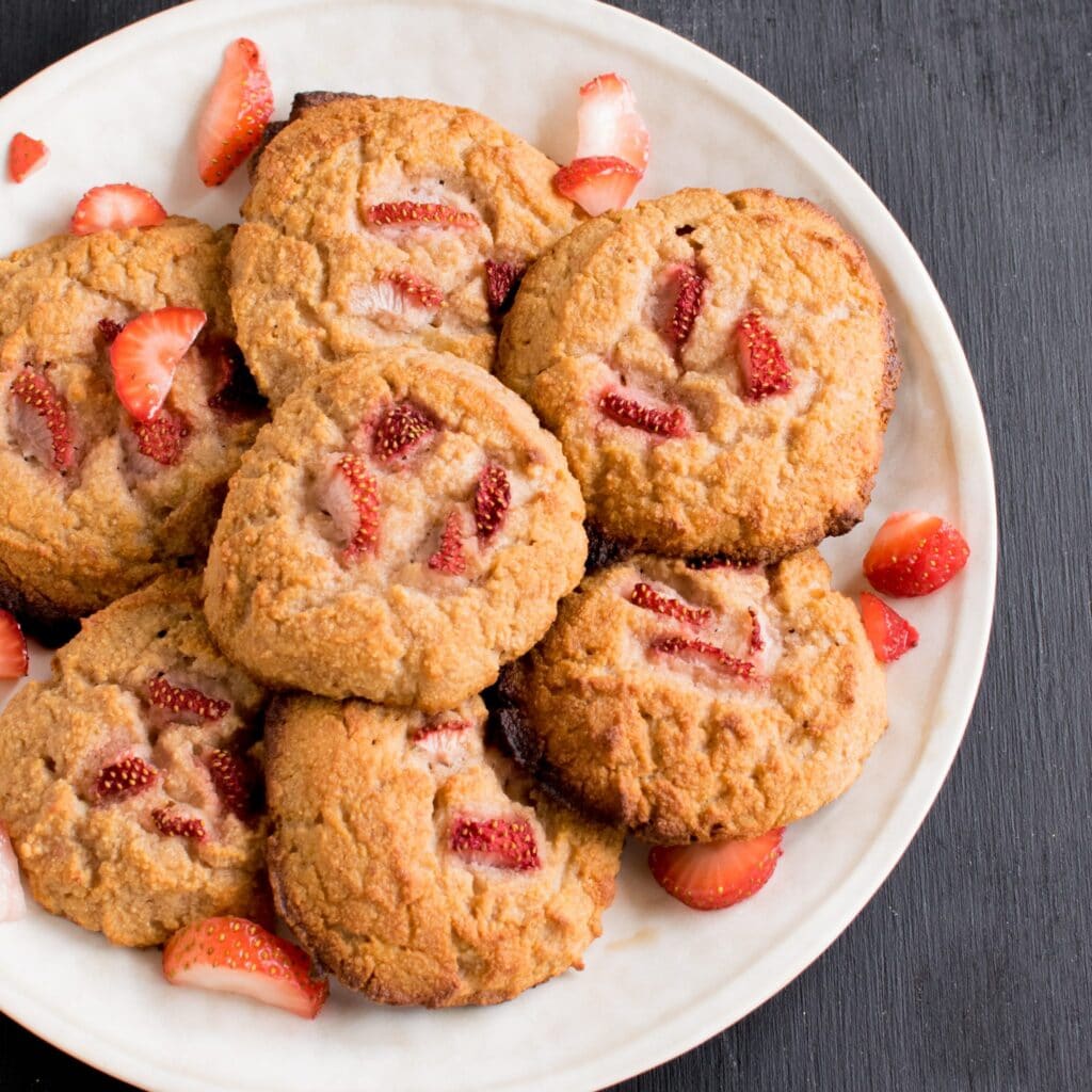 Top view of a plate with lots of Strawberry Yogurt Vegan Cookies 