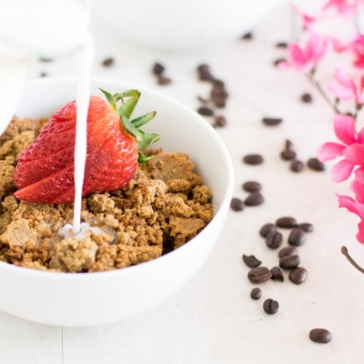 Milk pouring on Coffee Cheesecake Quinoa Granola Clusters