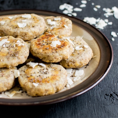 A plate full of 3 ingredient coconut chia energy cookies