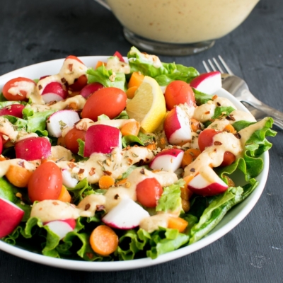 A 45 degree angle view of Vegan Chopped Salad with Chickpea Sour Cream Dressing