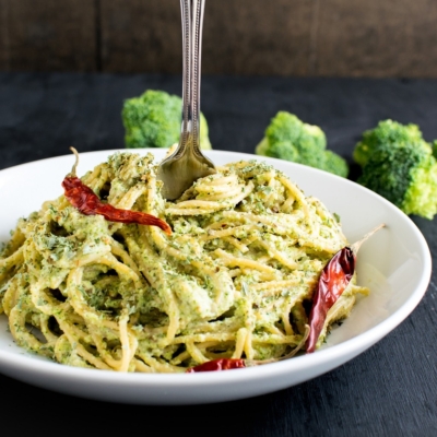 a fork rolling in Spicy Garlic Spaghetti in Broccoli Cheese Sauce